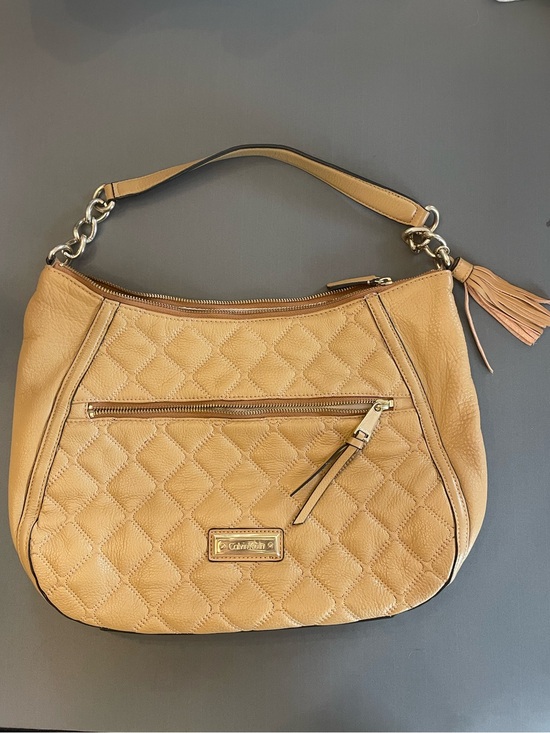 Calvin Klein Handbags - Calvin Klein Quilted Tan Shoulder Bag with Tassel Accent